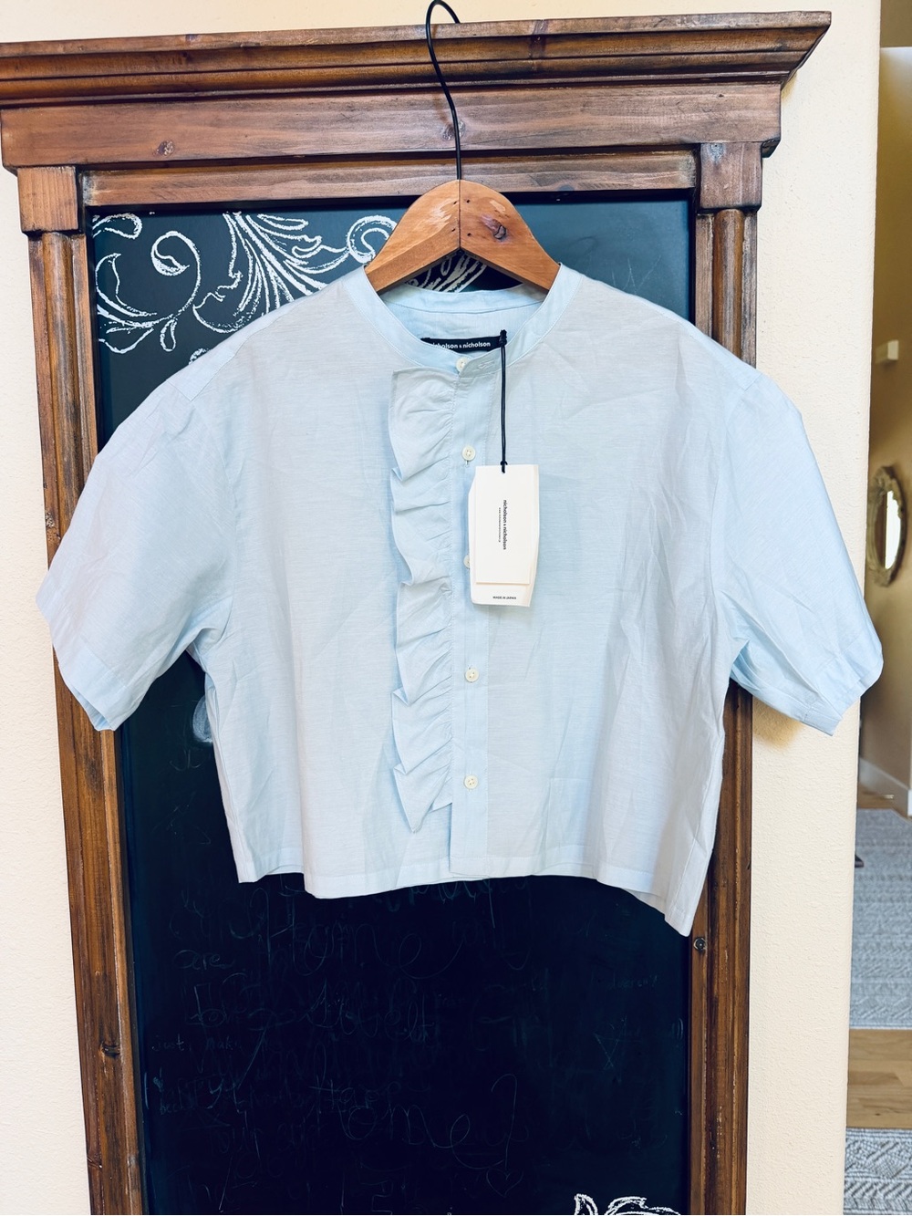 {Nicholson & Nicholson} Ruffle-Front Blouse in Light Blue
